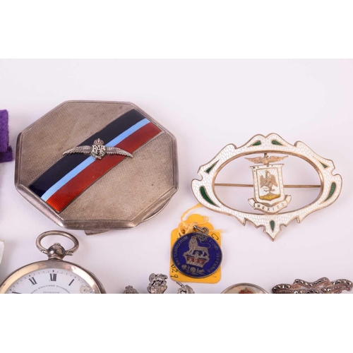 20 - A group of mixed military sweetheart brooches, cap badges and a silver an enamel RAF compact, togeth... 