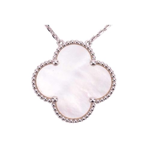 200 - Van Cleef & Arpels - a mother-of-pearl 'Magic Alhambra' pendant on chain, the 26.0 mm quatrefoil mot... 