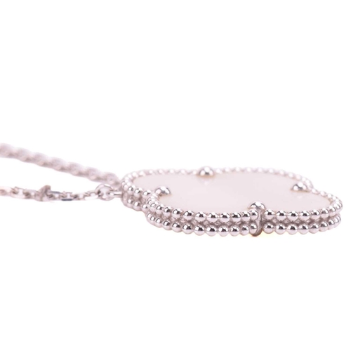 200 - Van Cleef & Arpels - a mother-of-pearl 'Magic Alhambra' pendant on chain, the 26.0 mm quatrefoil mot... 