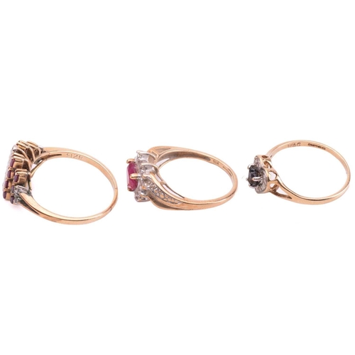 203 - Three gem set rings, comprising a heart-shaped sapphire set with three diamonds set in 9ct gold, rin... 