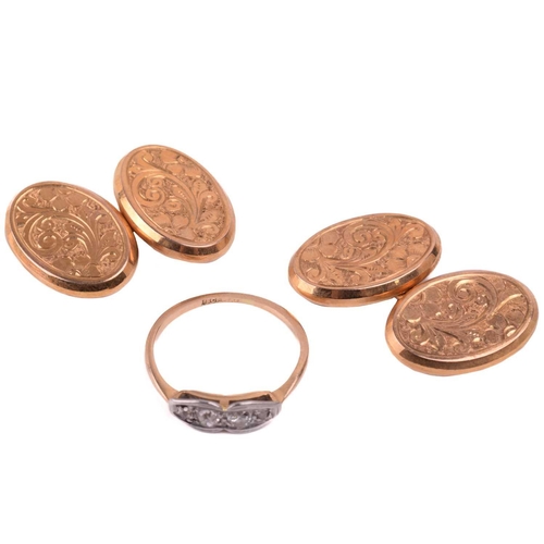 206 - A pair of gold cufflinks, the oval plaques foliate engraved, with chain link connections, with hallm... 