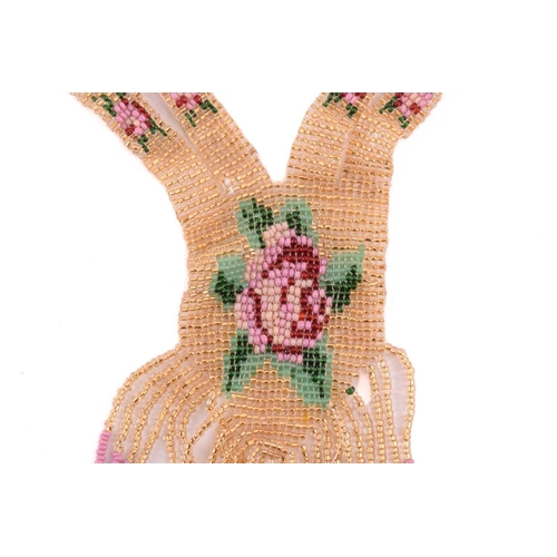 210 - A 1920's beaded sautoir necklace with a rose motif in pink, red, green and gold fine seed beads, mea... 