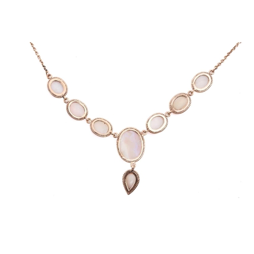 212 - An opal necklace, set with a row of oval white opals, the largest measuring 13.7mm x 9.8mm, with dro... 