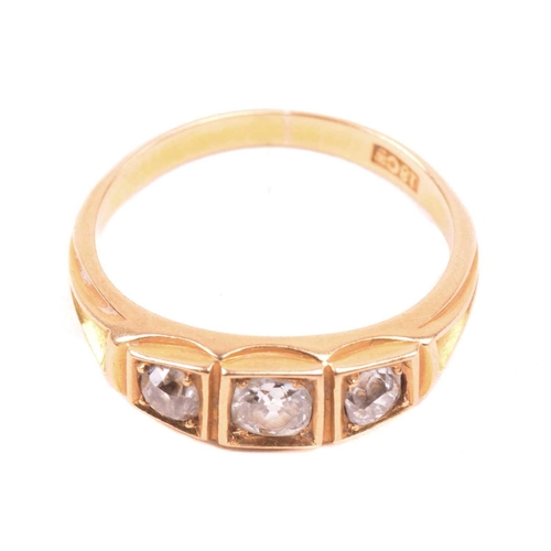 213 - A three-stone diamond half-hoop ring, scintillating with three graduated old-cut diamonds, with an e... 