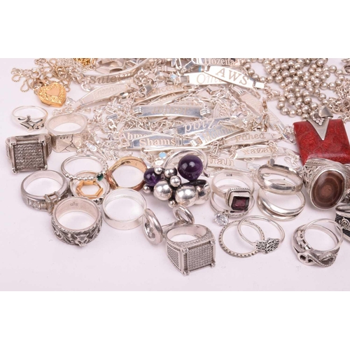 216 - A collection of white metal jewellery including various bangles, bracelets including identity bracel... 