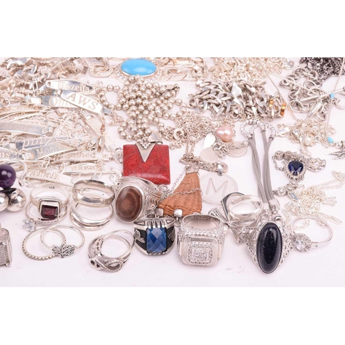 216 - A collection of white metal jewellery including various bangles, bracelets including identity bracel... 