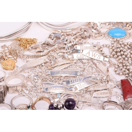 216 - A collection of white metal jewellery including various bangles, bracelets including identity bracel... 