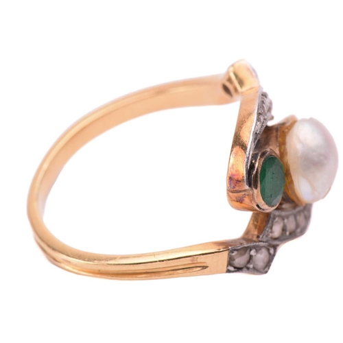 223 - An Edwardian split pearl, emerald and rose cut diamond cross-over ring, the diamond set shoulders le... 