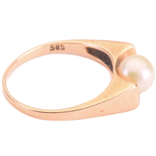 226 - A cultured pearl solitaire ring, set with a cream-coloured round pearl of 6.2 mm, in a concave mount... 