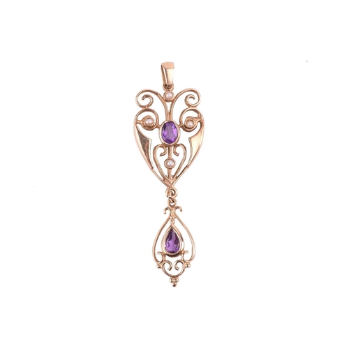 227 - An amethyst and seed pearl pendant with hallmarks for 9ct gold, measuring 50mm in length, a diamond ... 