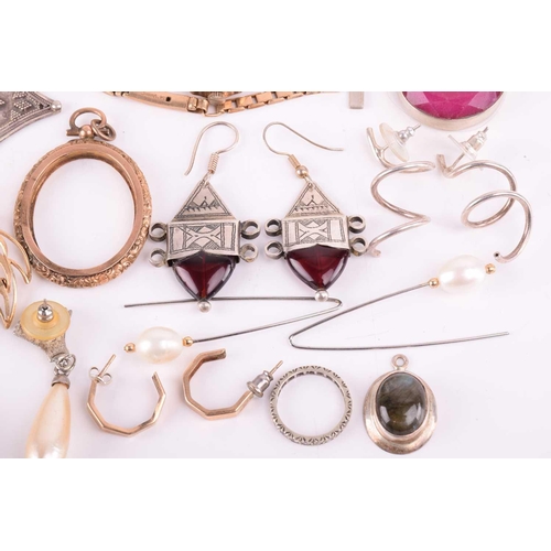 232 - A collection of jewellery, including pendants and earrings in white metal marked '925', and further ... 