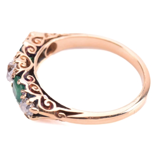 238 - An emerald and diamond five-stone carved half hoop ring, set with two emeralds and three old cut dia... 