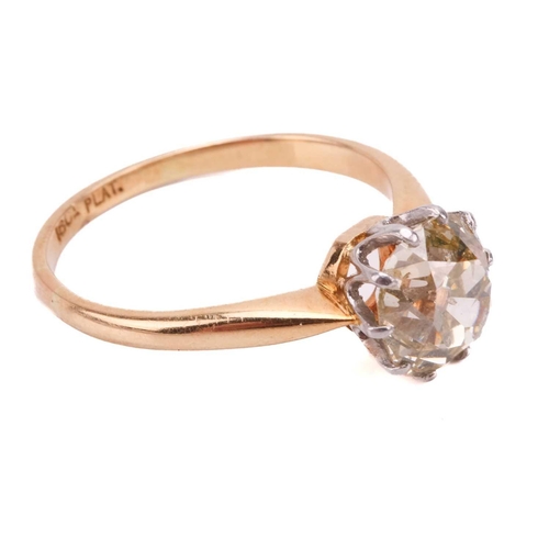 247 - A single stone diamond ring; the old cushion cut diamond in simple ten claw mount to an 18-carat gol... 