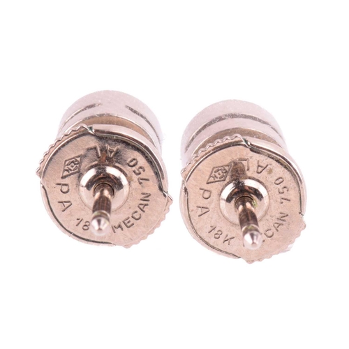 258 - A pair of diamond stud earrings, each set with a round brilliant cut diamond with an estimated weigh... 