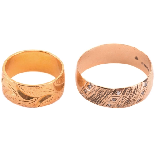 26 - Two wide wedding rings in yellow gold; the first comprises a flat band of 8.0 mm wide, with bright-c... 