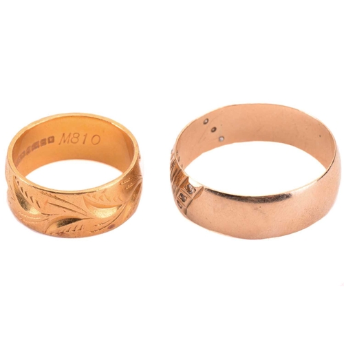 26 - Two wide wedding rings in yellow gold; the first comprises a flat band of 8.0 mm wide, with bright-c... 