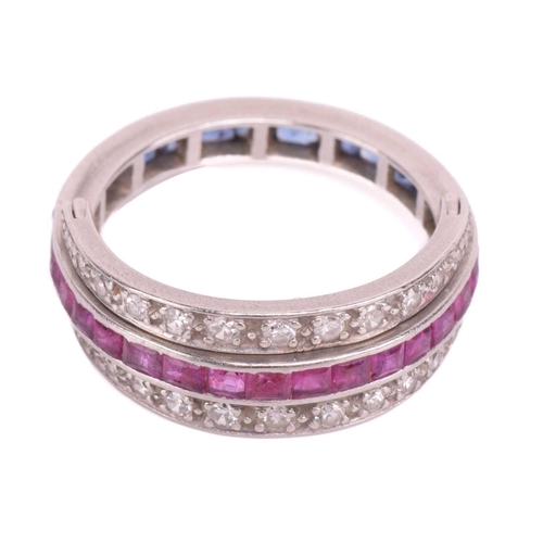 272 - An Art Deco 'Night and Day' flip-over eternity ring, with half of the central band channel set with ... 