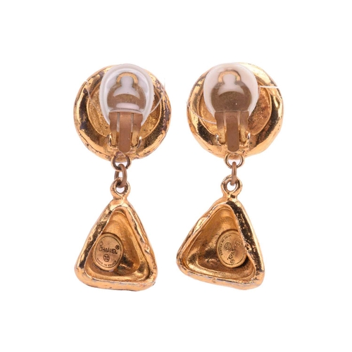 279 - Chanel - two pairs of clip-on earrings and a cocktail ring; including a pair of 1980s Byzantine-styl... 