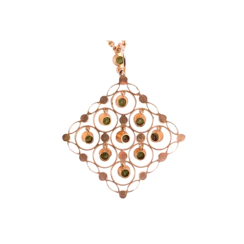 286 - An Edwardian tourmaline and seed pearl pendant, circa 1910, the beautiful lozenge shape design set w... 