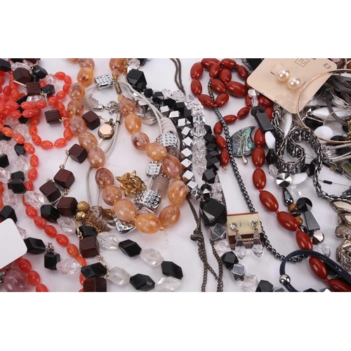 30 - A large quantity of costume jewellery including six sleeve garters, various buttons, beaded necklace... 