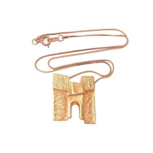 311 - Georg Jensen - a gilt 'Sunshine & Night' pendant on chain, a stylised and textured structure with ar... 