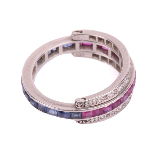 272 - An Art Deco 'Night and Day' flip-over eternity ring, with half of the central band channel set with ... 