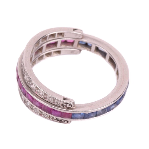 272 - An Art Deco 'Night and Day' flip-over eternity ring, with half of the central band channel set with ... 