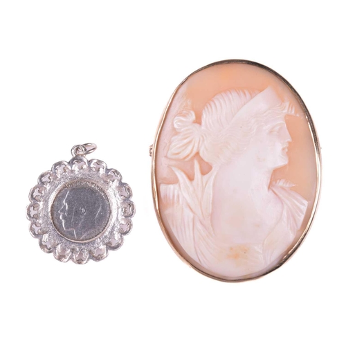 276 - A shell cameo brooch depicting a profile of a lady, measuring 50mm x 37mm, with hallmarks for 9ct go... 