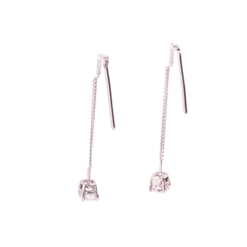 296 - A pair of diamond set drop earrings, featuring two claw set round brilliant cut diamonds measuring 4... 