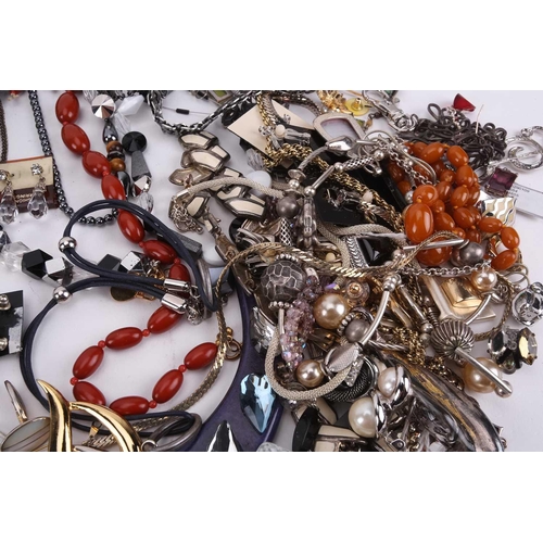 30 - A large quantity of costume jewellery including six sleeve garters, various buttons, beaded necklace... 