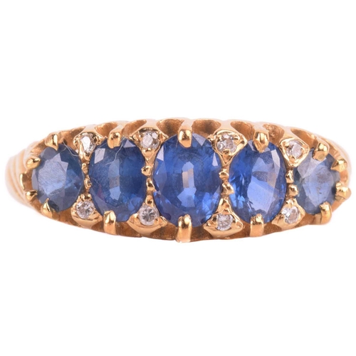 305 - A sapphire and diamond five-stone ring, set with a graduated row of five sapphires, the largest meas... 