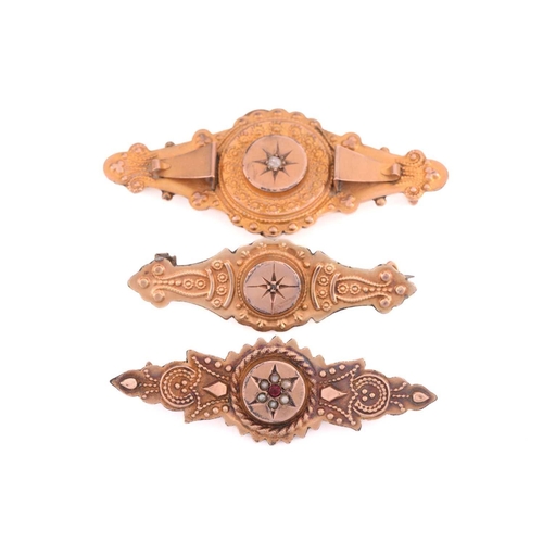 310 - A collection of six Victorian brooches including four set with seed pearls, two with hallmarks for 9... 