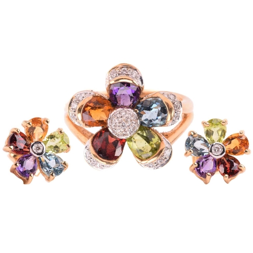 316 - A multi-gem floral cocktail ring and matching earrings; the five-petal flowerhead is composed of ova... 