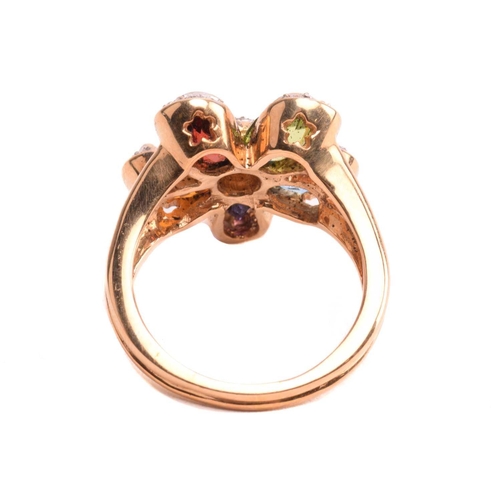 316 - A multi-gem floral cocktail ring and matching earrings; the five-petal flowerhead is composed of ova... 