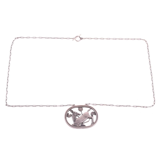 328 - Georg Jensen - a necklace with kneeling fawn and flowers, attached to a cable chain and toggle clasp... 