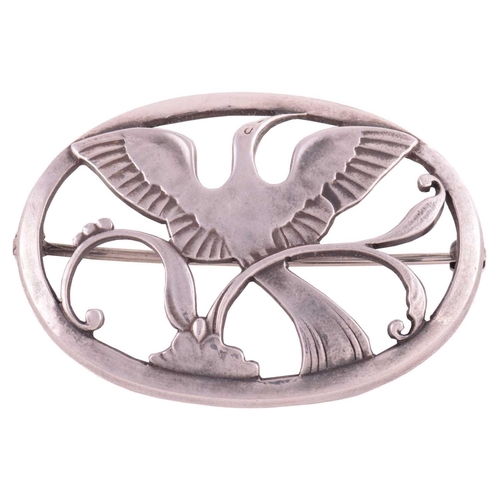 332 - Georg Jensen - a Bird of Paradise openwork brooch, depicting a bird spreading wings amongst the foli... 