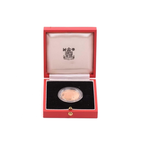 344 - A 1979 Kiribati 150 dollars commemorative gold coin, Royal Mint, boxed in plastic case. 22ct gold, 1... 