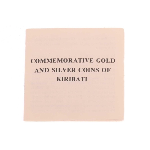 344 - A 1979 Kiribati 150 dollars commemorative gold coin, Royal Mint, boxed in plastic case. 22ct gold, 1... 