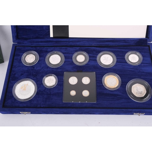 361 - A UK, millennium, collection of silver-proof coins, including Maundy money, number 02828 of 15000, i... 