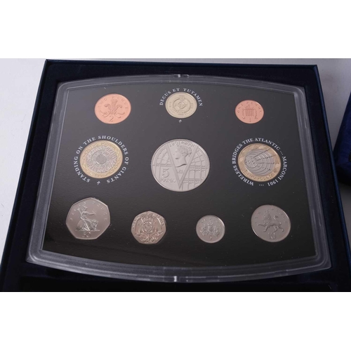 361 - A UK, millennium, collection of silver-proof coins, including Maundy money, number 02828 of 15000, i... 