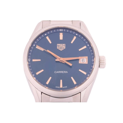 415 - A Tag Heuer Carerra blue dial unisex watch, featuring a Swiss-made quartz movement in a steel case m... 