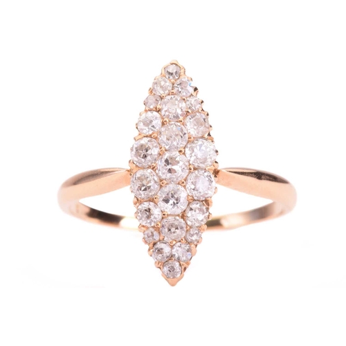 43 - A diamond marquise shape cluster ring, the central cluster set with old cut diamonds with a total es... 