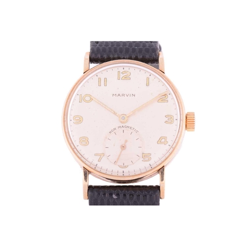 432 - A 9ct gold Marvin dress watch, featuring a Swiss-made hand-wound movement in a 9ct yellow gold case ... 