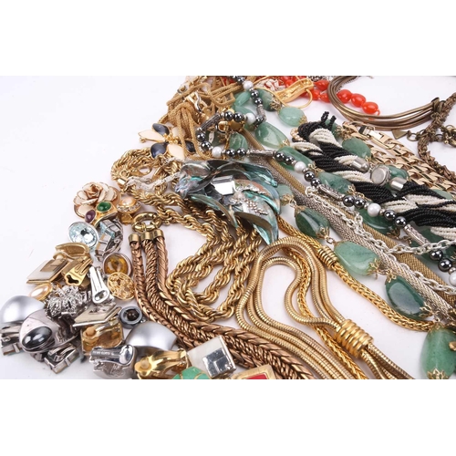 45 - A large collection of costume jewellery including various base metal chains, beaded necklaces, clip-... 