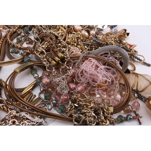 45 - A large collection of costume jewellery including various base metal chains, beaded necklaces, clip-... 