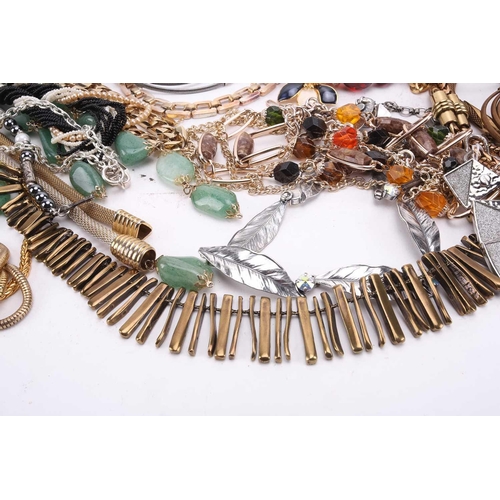 45 - A large collection of costume jewellery including various base metal chains, beaded necklaces, clip-... 