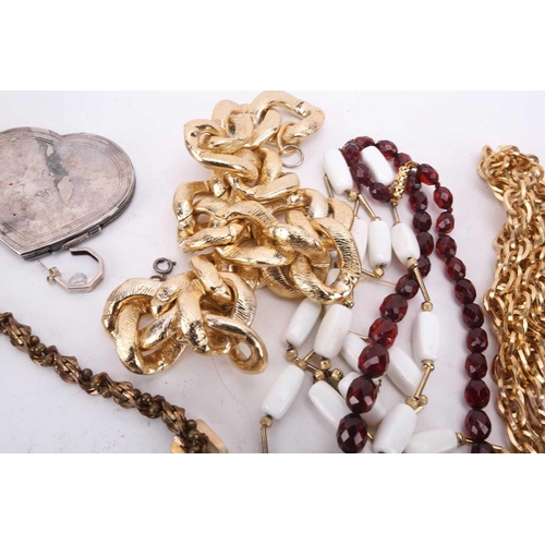 45 - A large collection of costume jewellery including various base metal chains, beaded necklaces, clip-... 