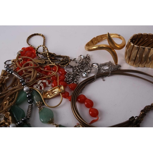 45 - A large collection of costume jewellery including various base metal chains, beaded necklaces, clip-... 