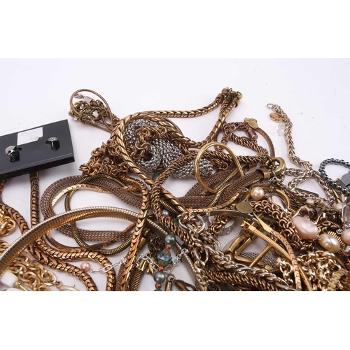 45 - A large collection of costume jewellery including various base metal chains, beaded necklaces, clip-... 