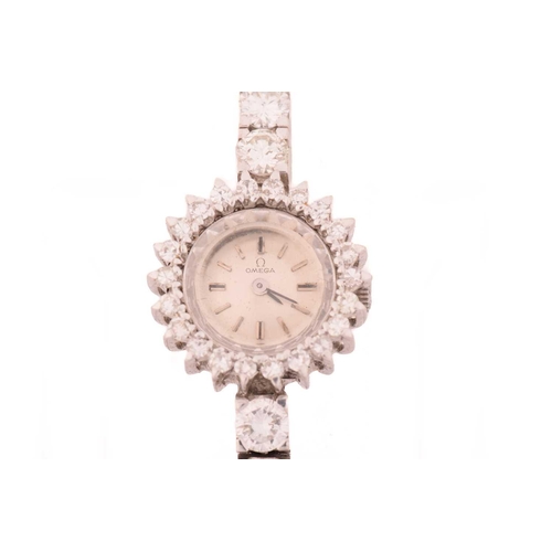 454 - An Omega fine jewellery dress watch featuring a Swiss-made hand-wound movement calibre: 650 in a whi... 